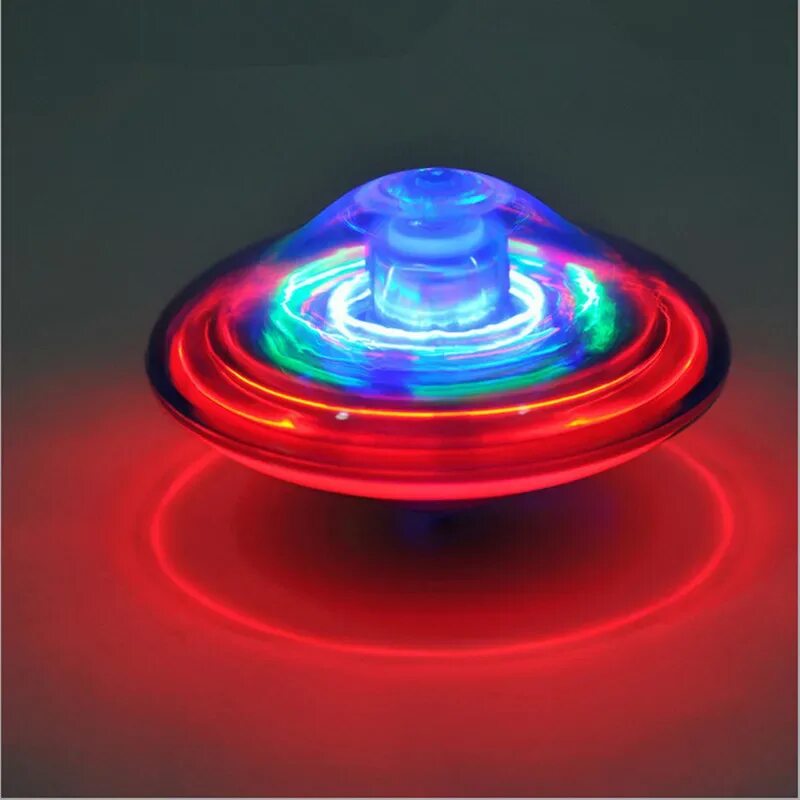 Крутится сама. Музыкальный волчок “ufo” с подсветкой. цветной,светящийся волчок spinning top 6850632. электрический волчок. крутится волчок.