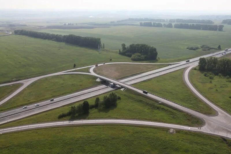 Купить билет кемерово ленинск кузнецкий. Трасса Ленинск-Кузнецкий Новокузнецк. -Кемерово развязка Ленинск-Кузнецкий. Автомагистраль Кемерово Ленинск-Кузнецкий развязки Озеленение. Магистраль Кемерово Новокузнецк.