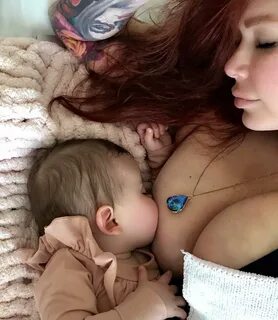 Mom Breastfeeding The Baby Xxx.