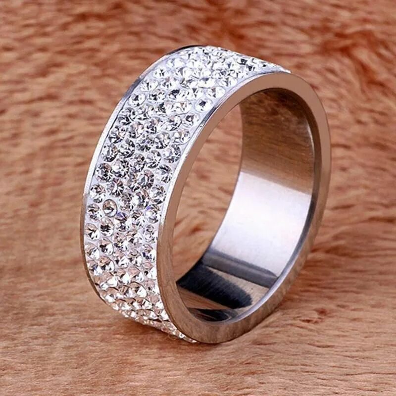 Купить женские кольца камнями. Широкие обручальные кольца. Широкое серебряное кольцо. Широкое кольцо с камнями. Обручальные кольца с камушками.