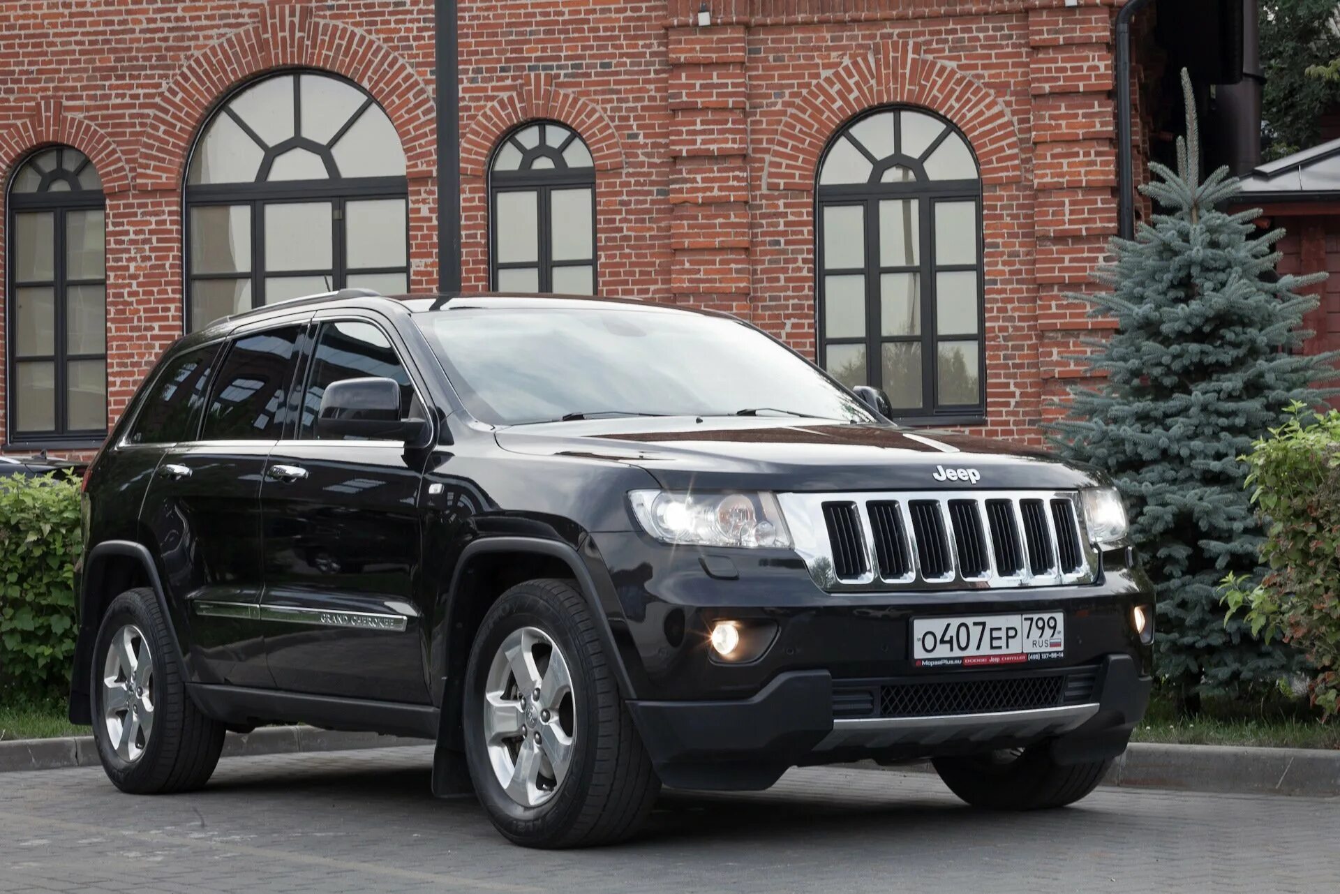 Черная с большими формами. Grand Cherokee wk2. Джип Гранд Чероки wk2. Jeep Grand Cherokee wk2 2010. Jeep Grand Cherokee IV (wk2).