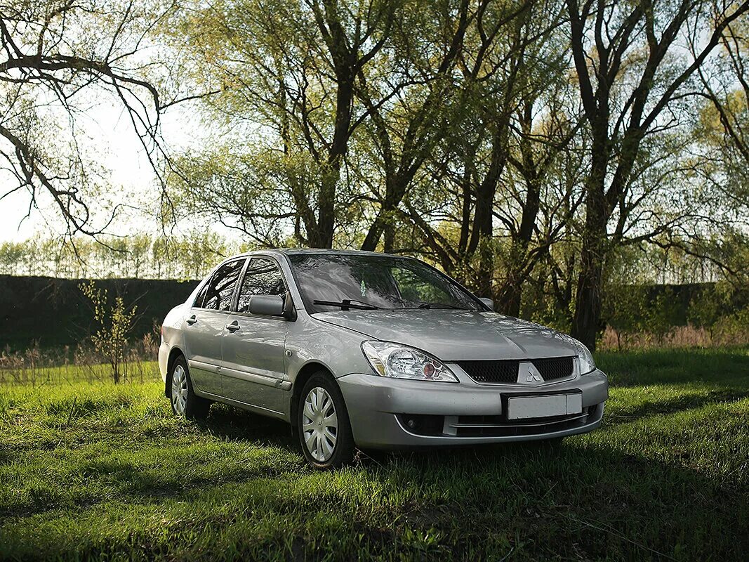 Mitsubishi lancer 2005 года. Mitsubishi Lancer IX 2005. Мицубиси Лансер 9 серебристый. Митсубиси Лансер 9 2007. Mitsubishi Lancer 9 серебристый металлик.