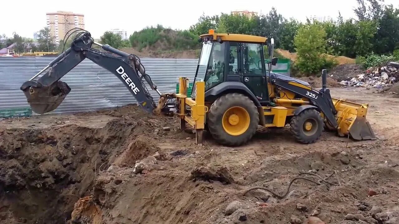 Не заводится экскаватор. Погрузчик John Deere 325j. Гидромолот John Deere 325. Экскаватор погрузчик гидромолот John Deere 315sl. 325j John Deere фронтальный ковш.