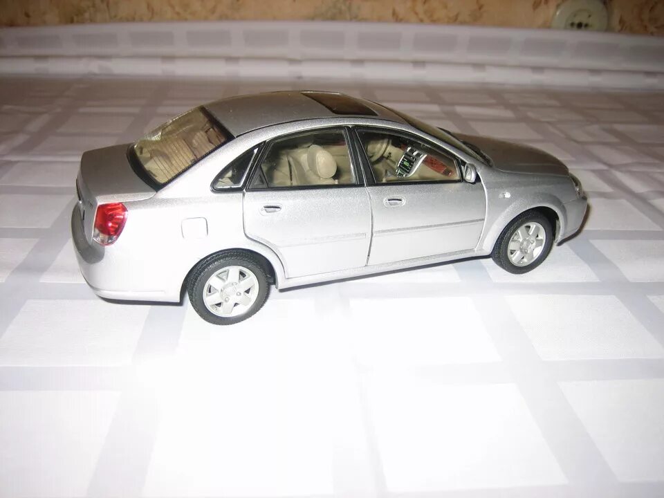 Chevrolet Lacetti 1 43. Шевроле Лачетти универсал модель 1:43. Модель Шевроле Лачетти хэтчбек 1 43. Модель Chevrolet Lacetti 1 37.