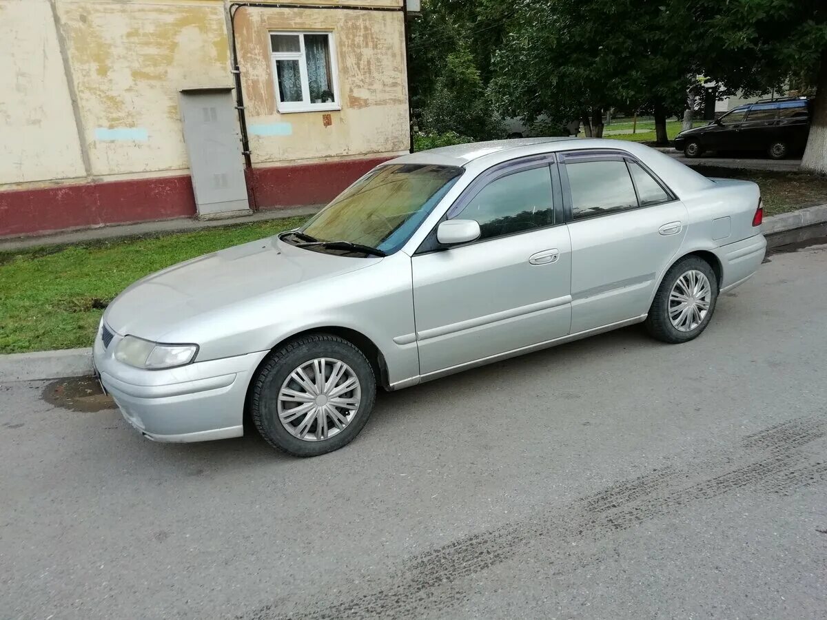 Мазда капелла 1998 седан. Mazda Capella 1998 седан. Мазда капелла 1998 сидан. Mazda Capella 1998.