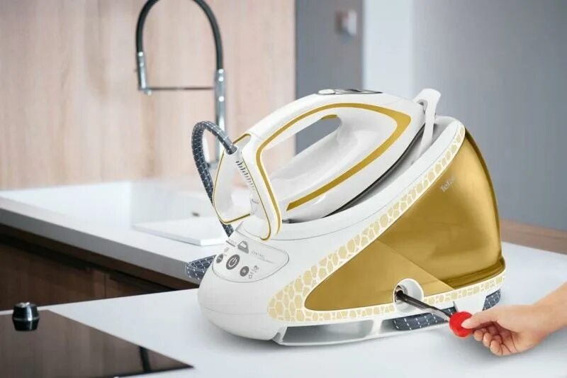 Gv9711e0 парогенератор. Tefal gv9581. утюг pro tefal express ultimate gv9581. парогенератор tefal pro express ultimate. утюг тефаль с парогенератором.