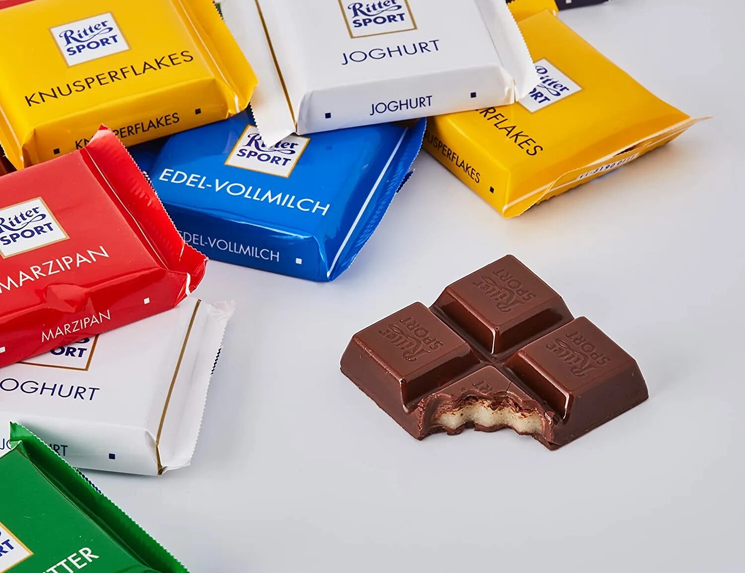 Риттер спорт мини. Риттер спорт кубик. Риттер спорт маленькие. Ritter Sport маленькая. Риттер мини купить