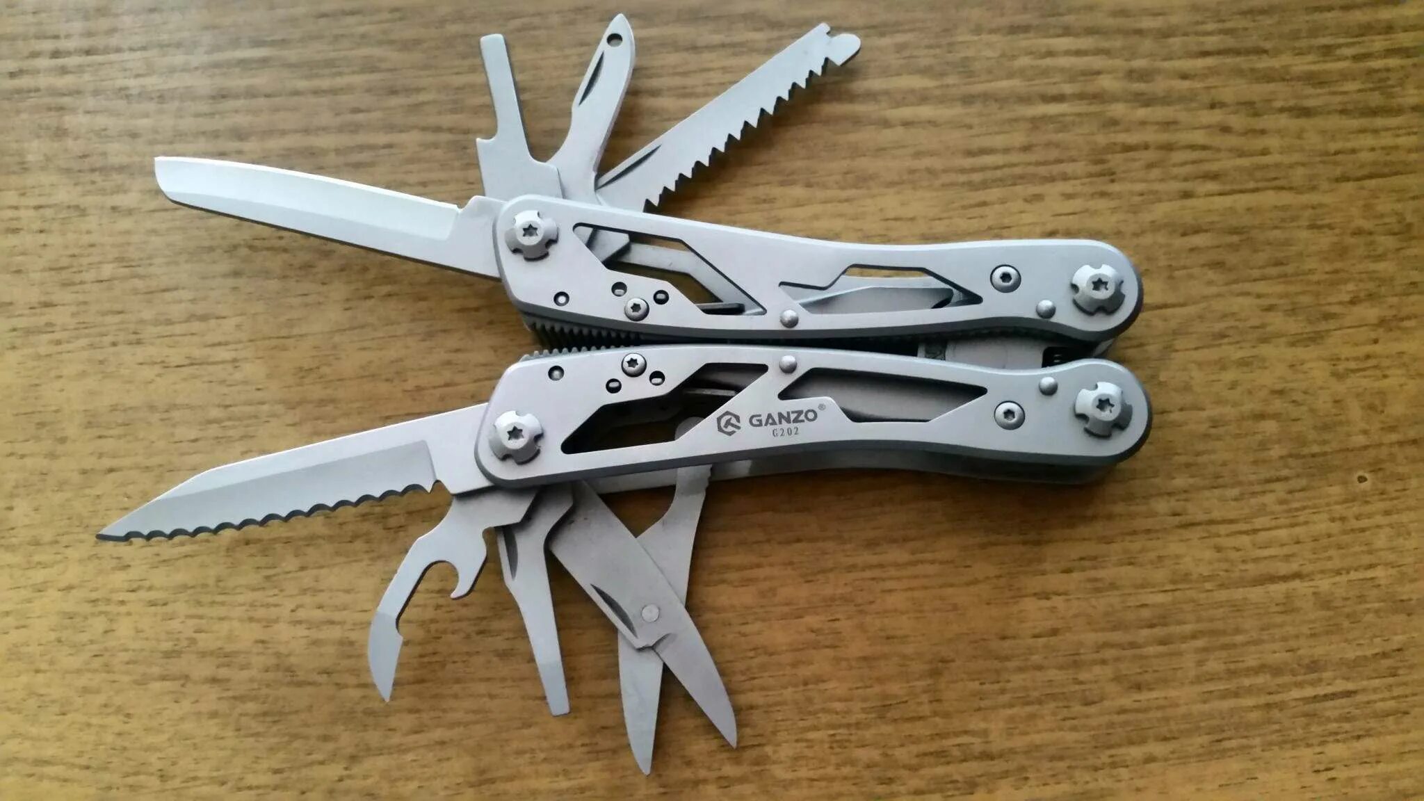 Ganzo g766-or. Мультиинструмент ganzo g202. Мультитул ганзо 202. Мультитул g202. Мультитул ganzo g202.
