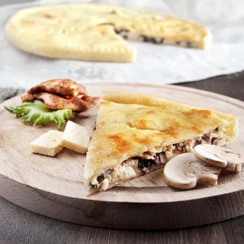 осетинский пирог фыджин. фыдджин владикавказ. осетинские пироги диаметр. осетинский пирог. осетинский пирог капуста сыр.