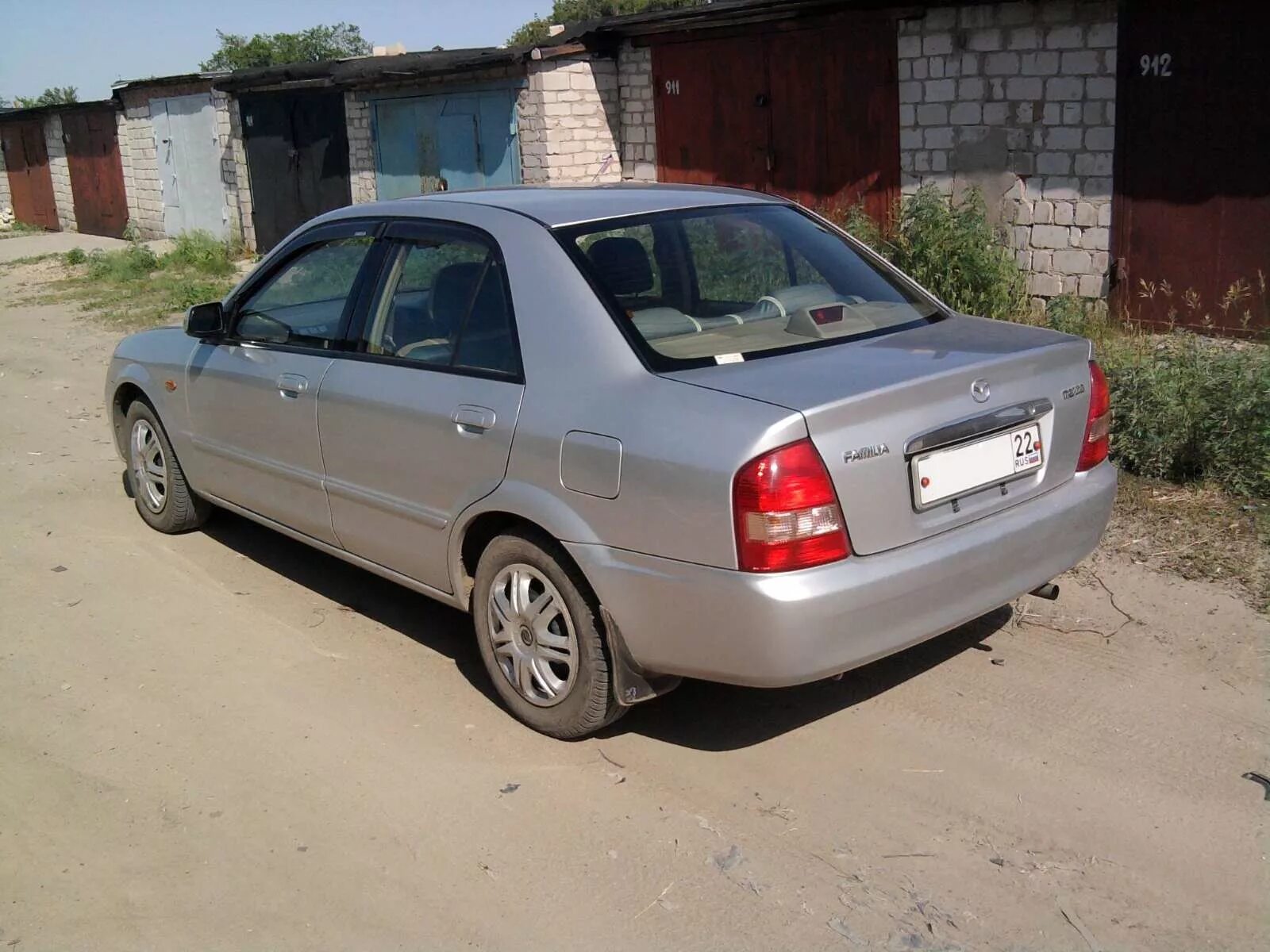 Mazda familia 2003 хэтчбек. Mazda до 2000 года. мазда фамилия поколения. Mazda 6026 2000. мазда фамилия поколения.