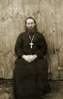 Священник садится