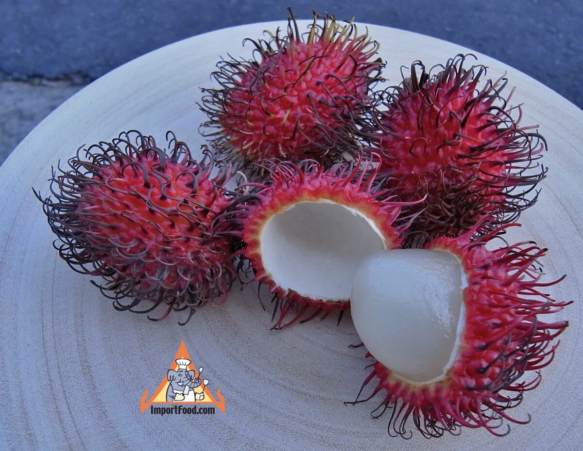 рамбутан плод. личи ягода. экзотический фрукт дуриан. рамбутан личи дуриан. таиландские фрукты рамбутан.