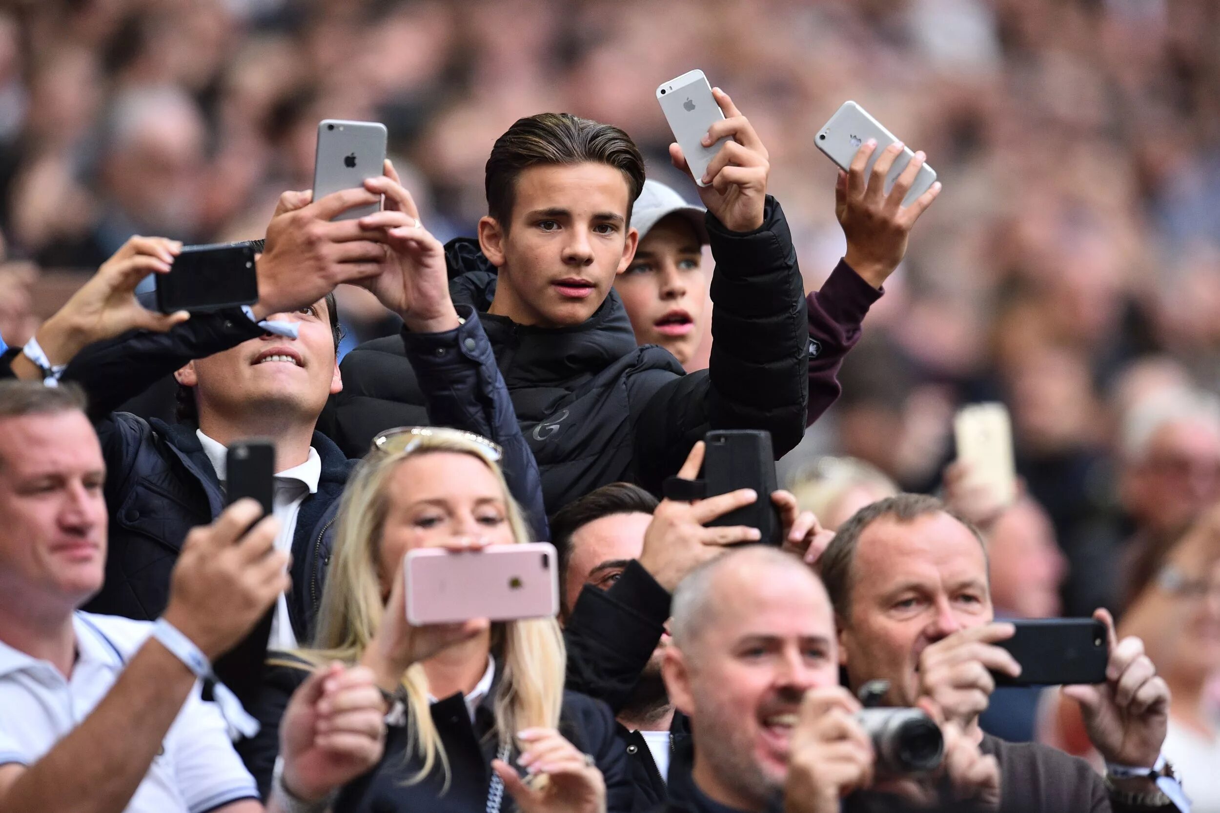 Take fans. Premier League Fans. Premier League Fans photo Phones. Premier League crowd Phones. EPL Fans Phones.