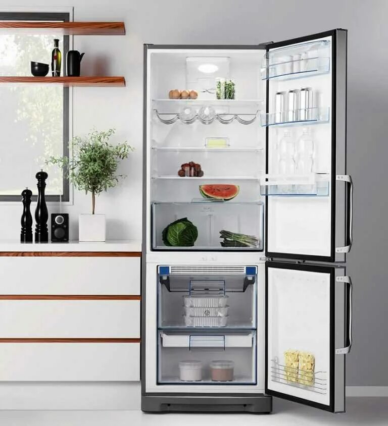 Холодильник. Открытый холодильник. Стильный холодильник. Холодильник на кухне.