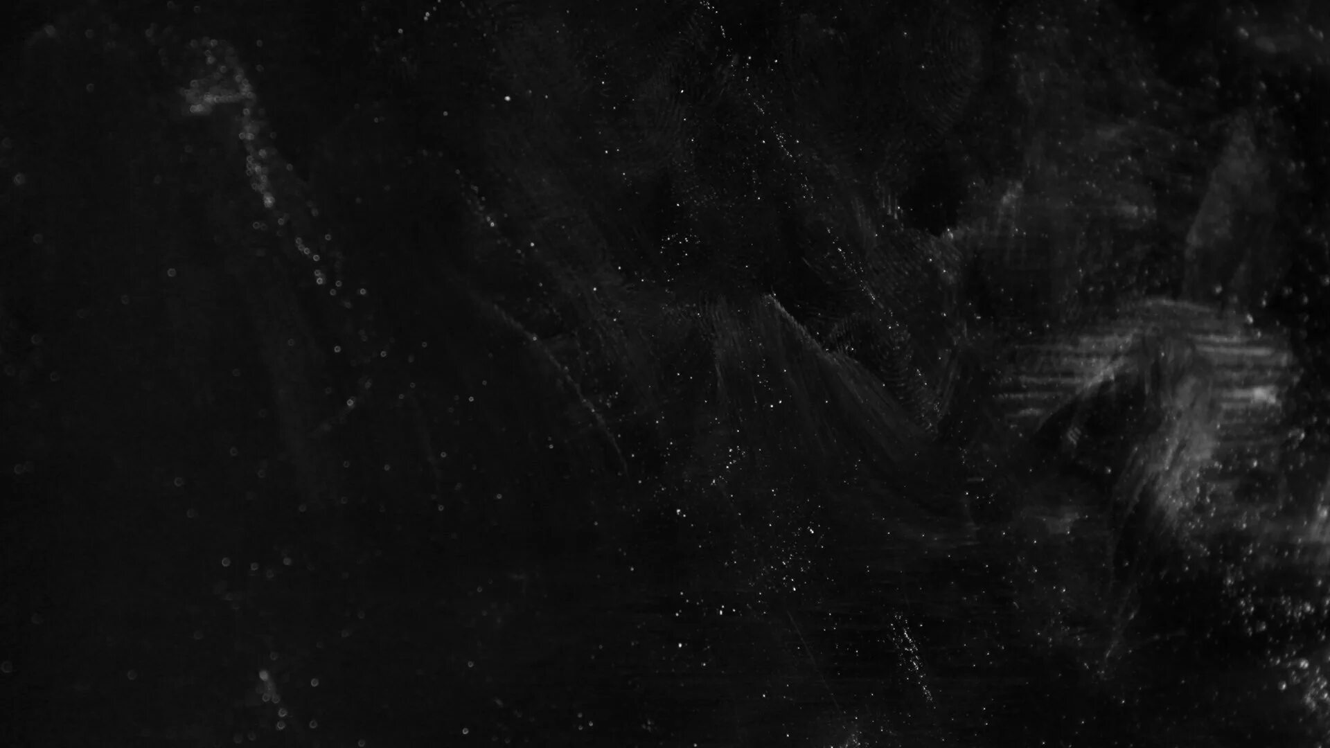 Текстура потертости. Пыль на черном фоне. Текстура царапин. Пыль на черном фоне. Текстура пленки.