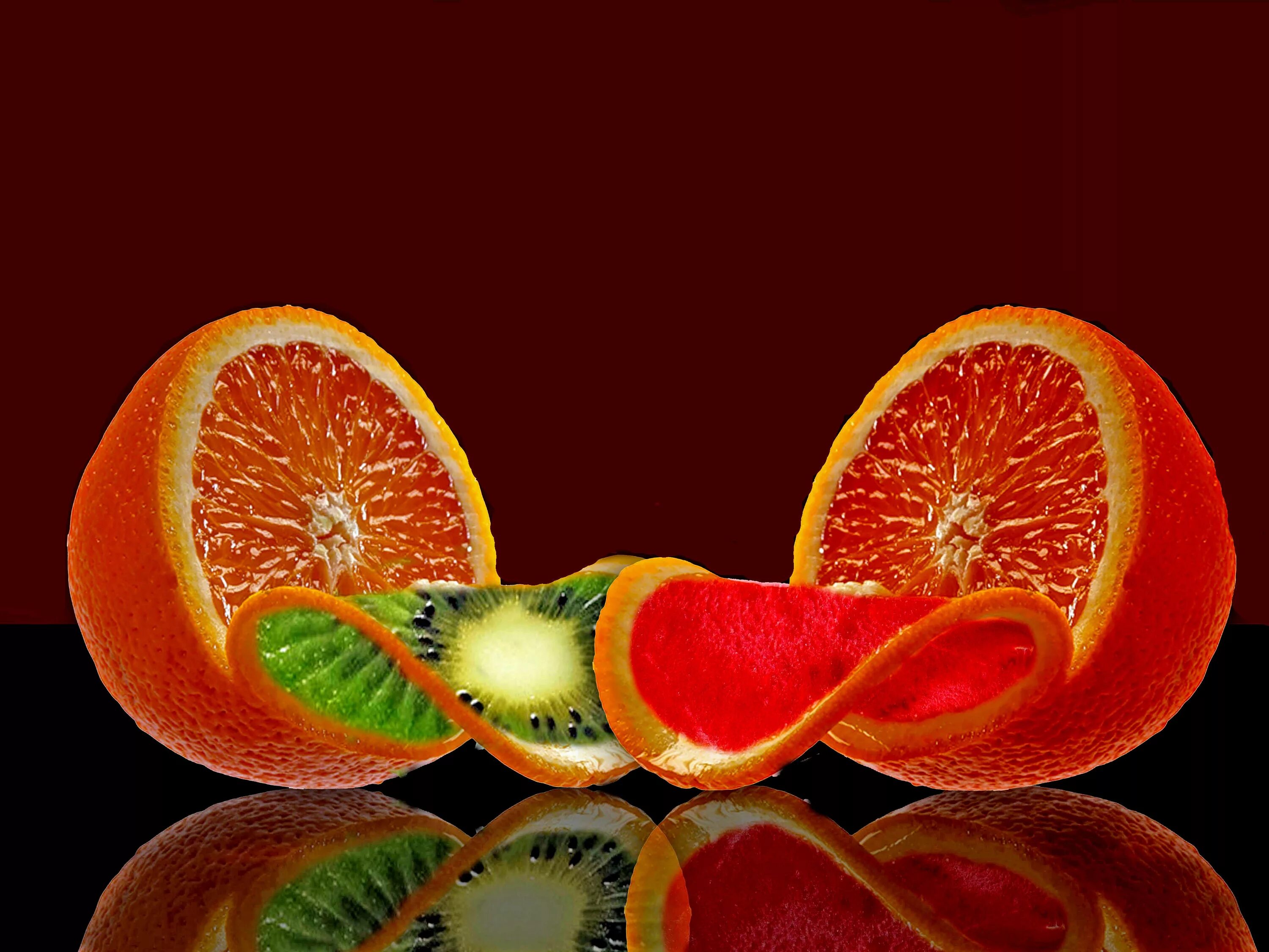 Фруктовые дольки. Сочные фрукты. Апельсин. Фрукты в разрезе.