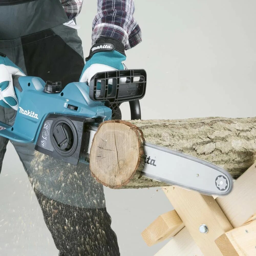 Пила работа. Пила цепная makita uc3541a. цепная электрическая пила makita uc3041a. пила цепная makita uc 3041 a. электропила makita uc 3541 a.