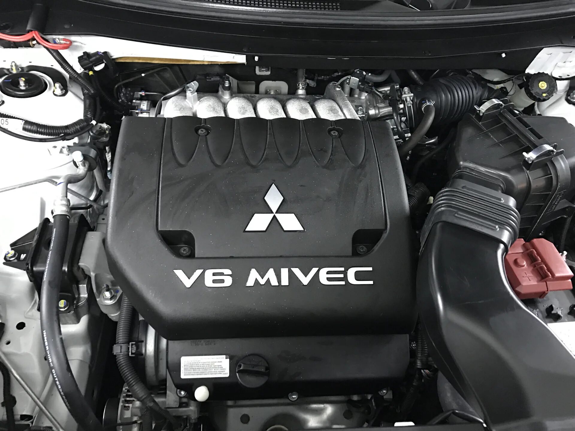 Mitsubishi mivec. MIVEC 2.4 Митсубиси Аутлендер. Mitsubishi Outlander 3 v6. Клапан MIVEC 6b31. V6 мотор ХЛ Аутлендер 3.0.