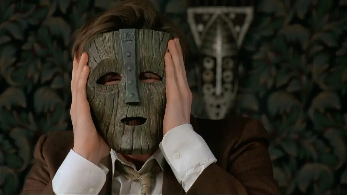 Человек в маске устраивает изощренные. Маска the Mask, (1994). Джим Керри маска. Mask Джим Керри.