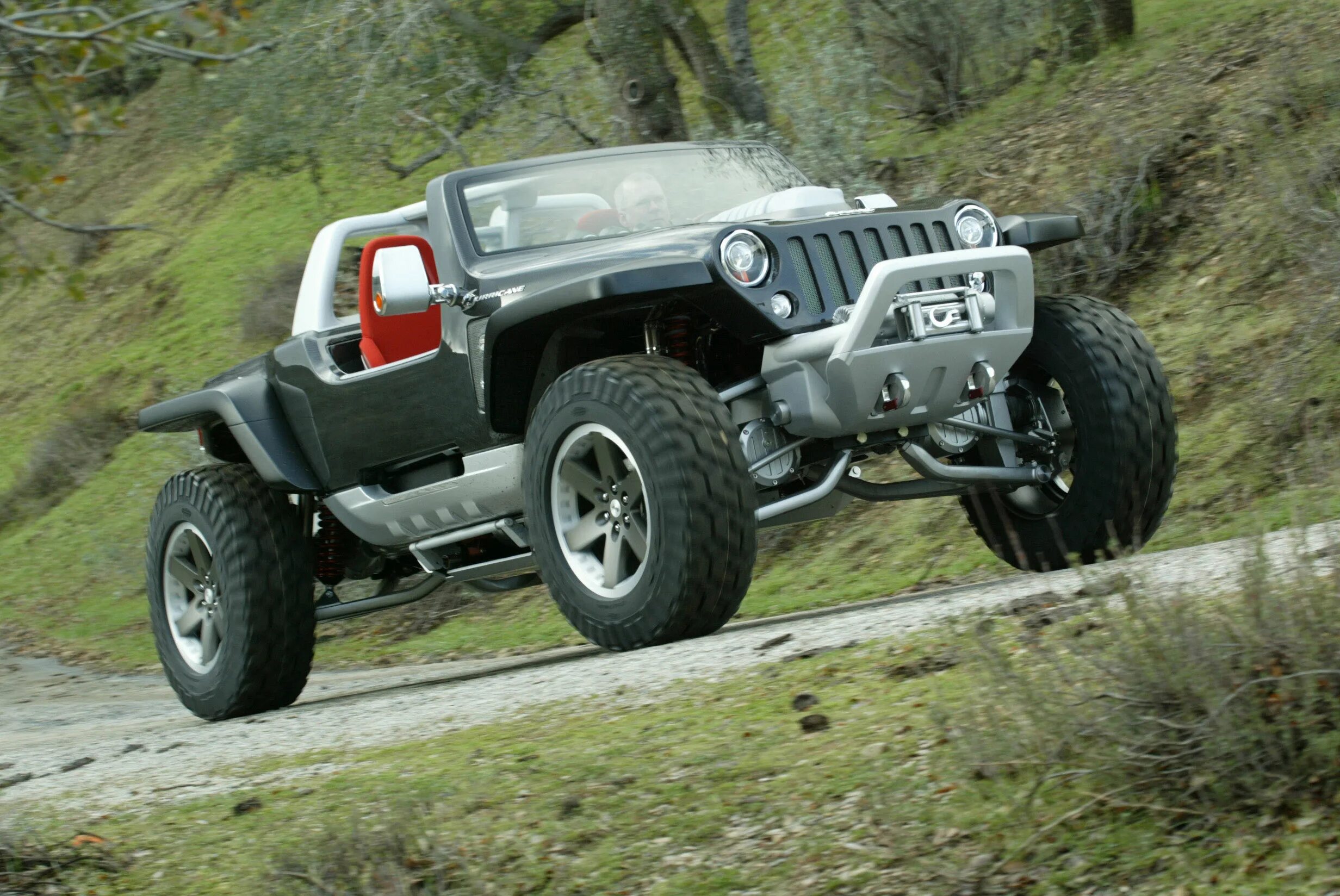 Лучшие проходимые автомобили. Jeep Hurricane 2005. 2005 Jeep Hurricane Concept. Jeep Wrangler 2012. Jeep Hurricane Concept.