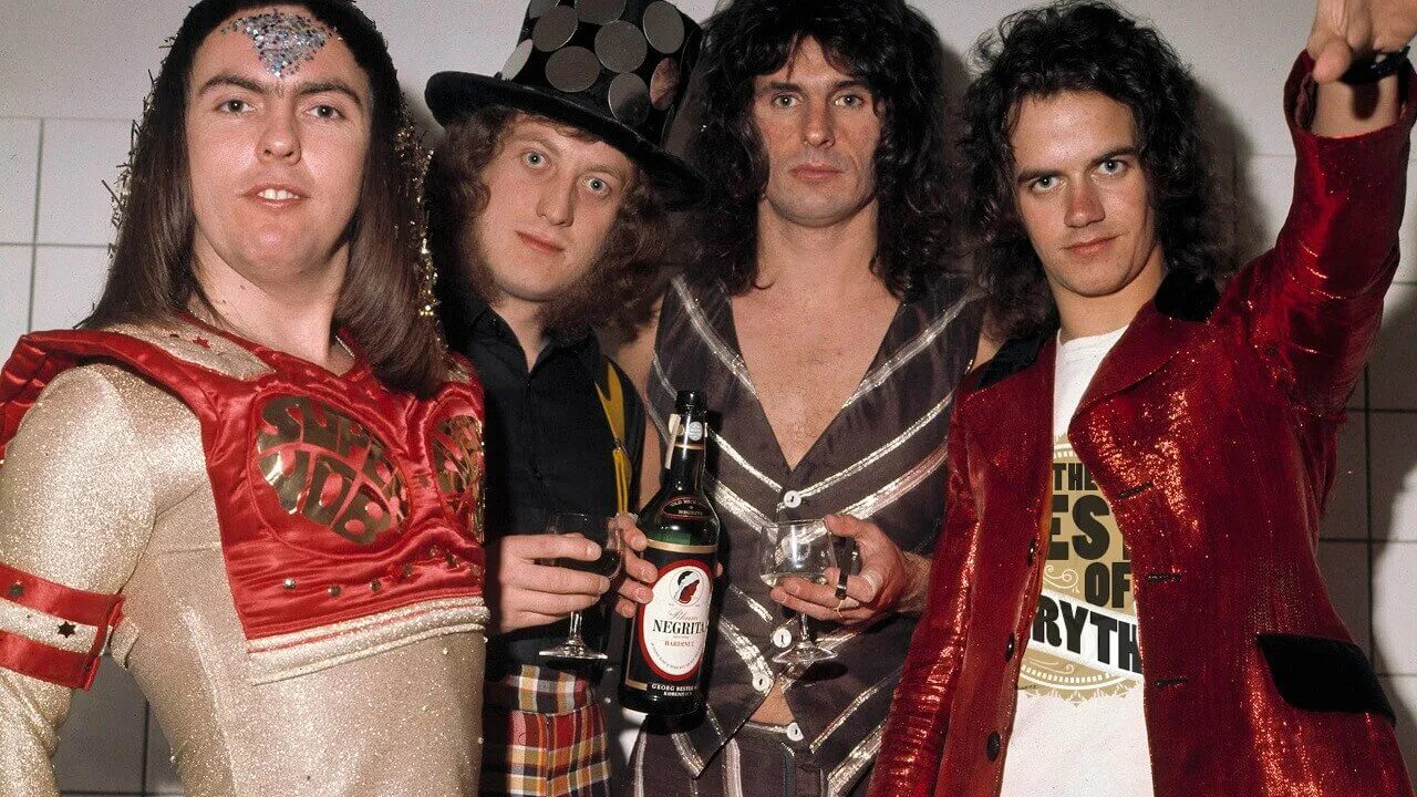 Группы 70 80 х. Слейд рок группа. Slade Stone. Английская группа 80 х годов. Фронтмен группы 70-х.