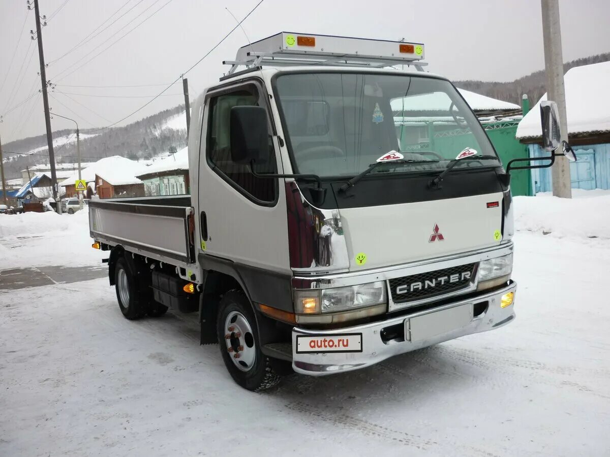 Продажа японских грузовиков. Митсубиси Фусо Кантер 2001. Mitsubishi Canter бортовой 2-3 тонны. Митсубиси Фусо Кантер 2001 бортовой. Mitsubishi Canter 2001.