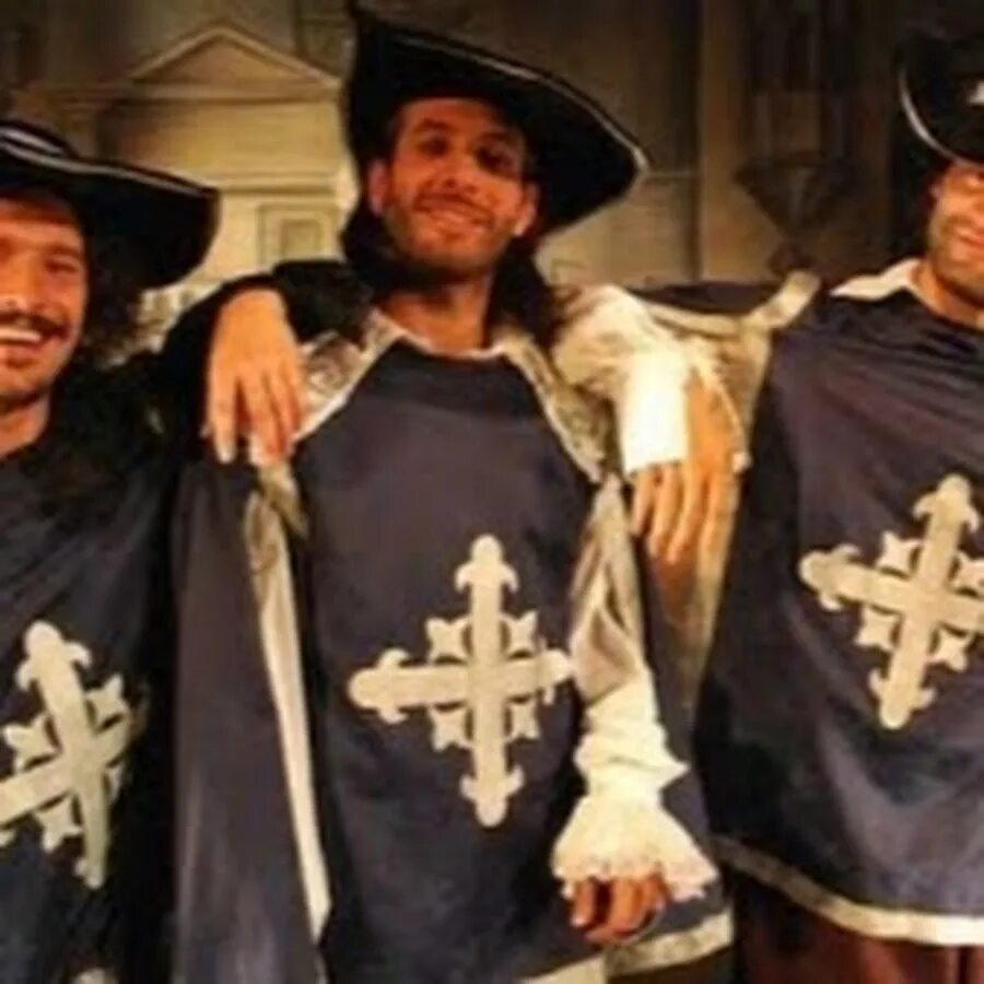 Три мушкетера третья часть. Королевские мушкетёры 1999. DARTAGNAN группа. Д Артаньян и три мушкетера. Крест мушкетера.