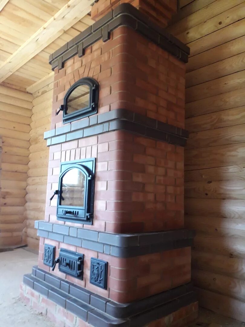 финская противоточная печь. печь в доме из кирпича. отопительная печь финка. финская противоточная печь. отопительная кирпичная печь 100кв.