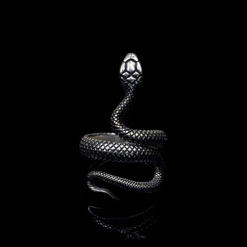 Змей на заставку телефона. Змеи на черном фоне. Черная змея. Кобра на темном фоне. Черная Кобра.