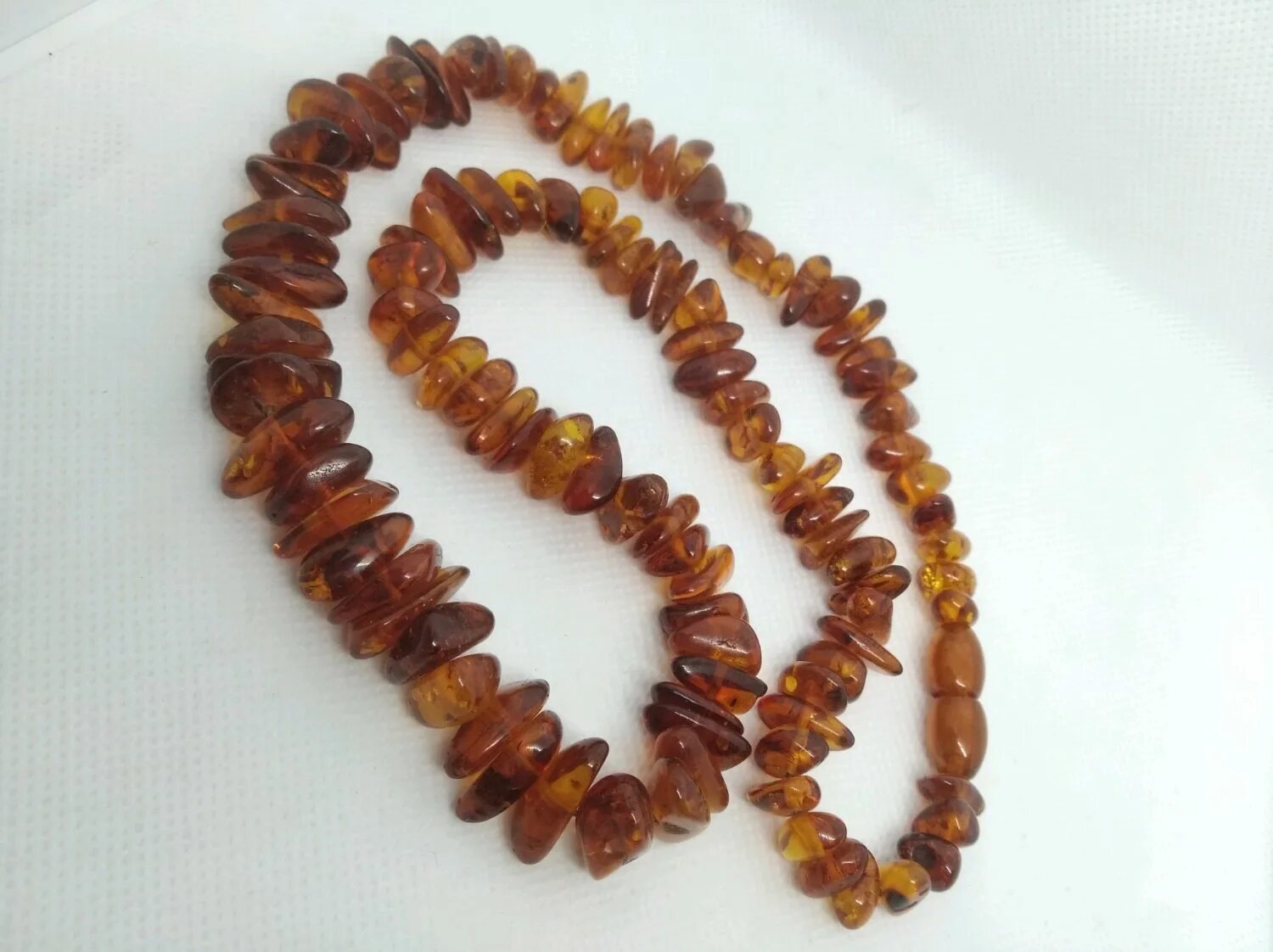 Унгварит камень. Как почистить янтарь. Как почистить янтарь. Янтарь камень помутнел. Почистить янтарные бусы в домашних условиях.