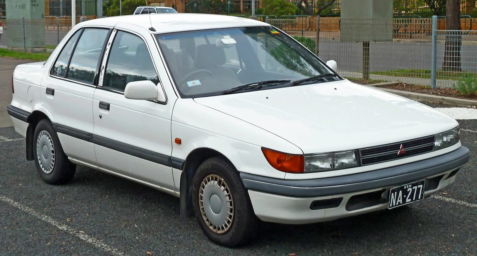 Митсубиси 1990. Митсубиси Лансер 4. Митсубиси Лансер 1990. Lancer Mitsubishi Lancer 1990. Мицубиси ланцер 1990.