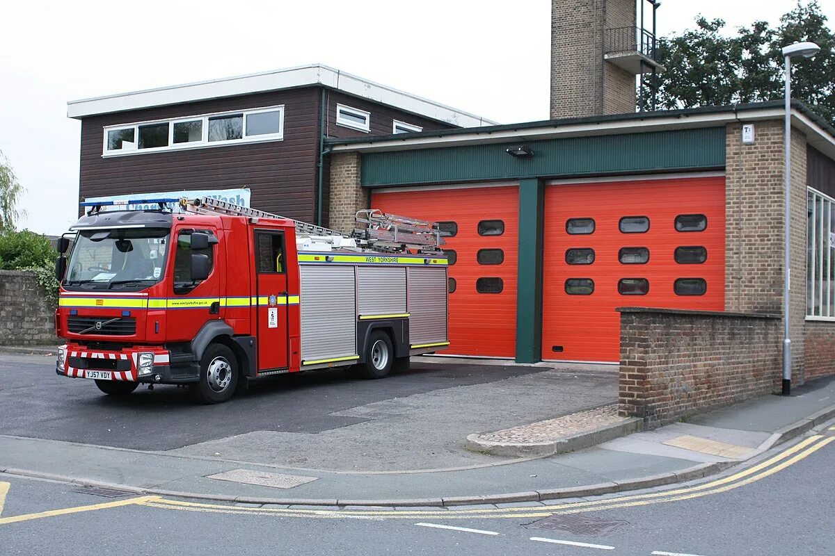 Happel Cornelisse Verhoeven builds red Fire Station Wilrijk in Antwerp Fire stat