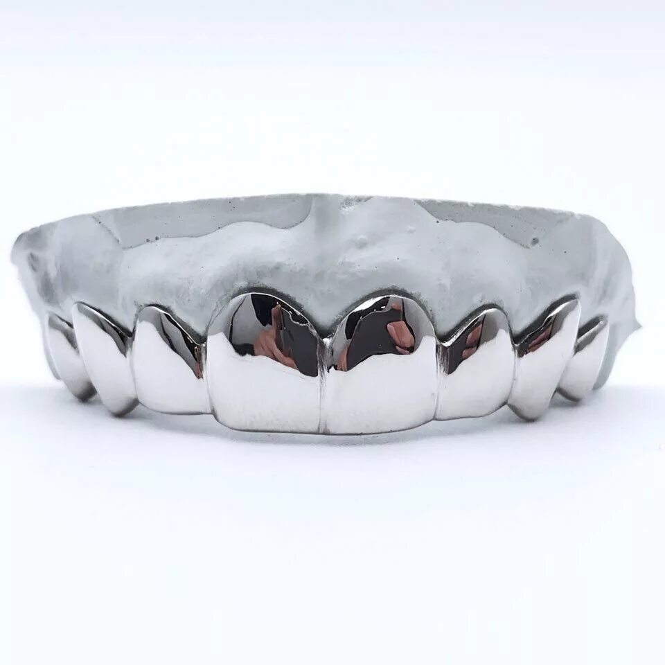 Сколько стоит металлические зубы. Silver Grillz. Металлическая коронка. Цельнолитая металлическая коронка.
