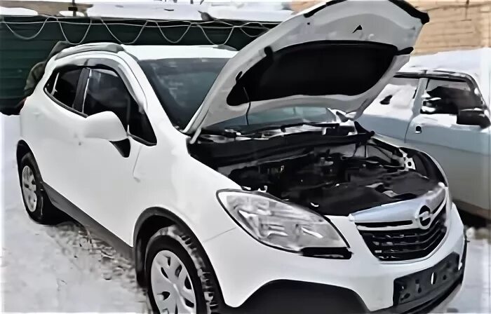 Opel Mokka 2014 капот артикул. Под капотом Опель Мокка 2014. Капот Опель Мокка 2018.