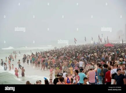 The crowd packs the beach during spring break festivities in Panama City Be...