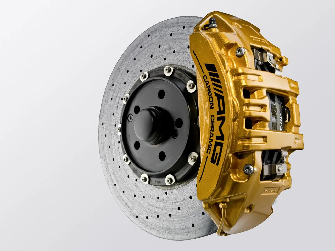 Тормоз фото. Тормозной диск с суппортом. Brembo toyota lc200 колодки. Направляющие задние колодки lx570. Суппорт с колодками лексус 570.