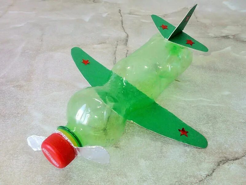 Ракета своими руками из подручных материалов. Самолёт из пластиковой бутылки. Военный самолет из бутылки. Самолет из пластмассовой бутылки. Поделка самолёт из пластиковой бутылки.