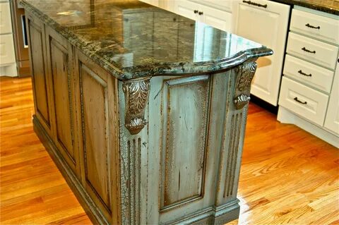 Fabulous island with amazing distressed finish and elaborate details. Kitchen re