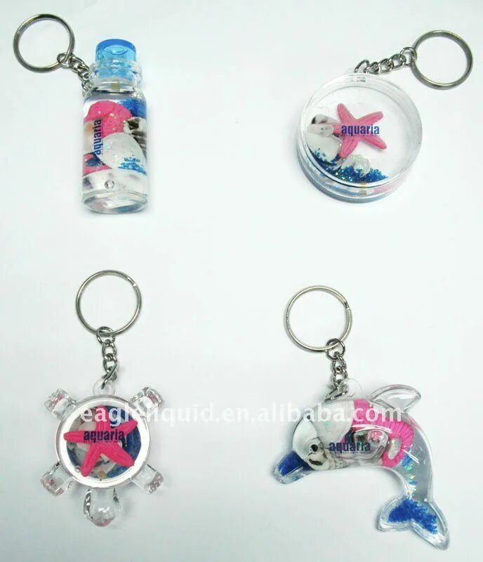 Аква брелок. Брелки с жидкостью. Брелок с водой. Аква брелок. Брелок с жидкостью внутри.
