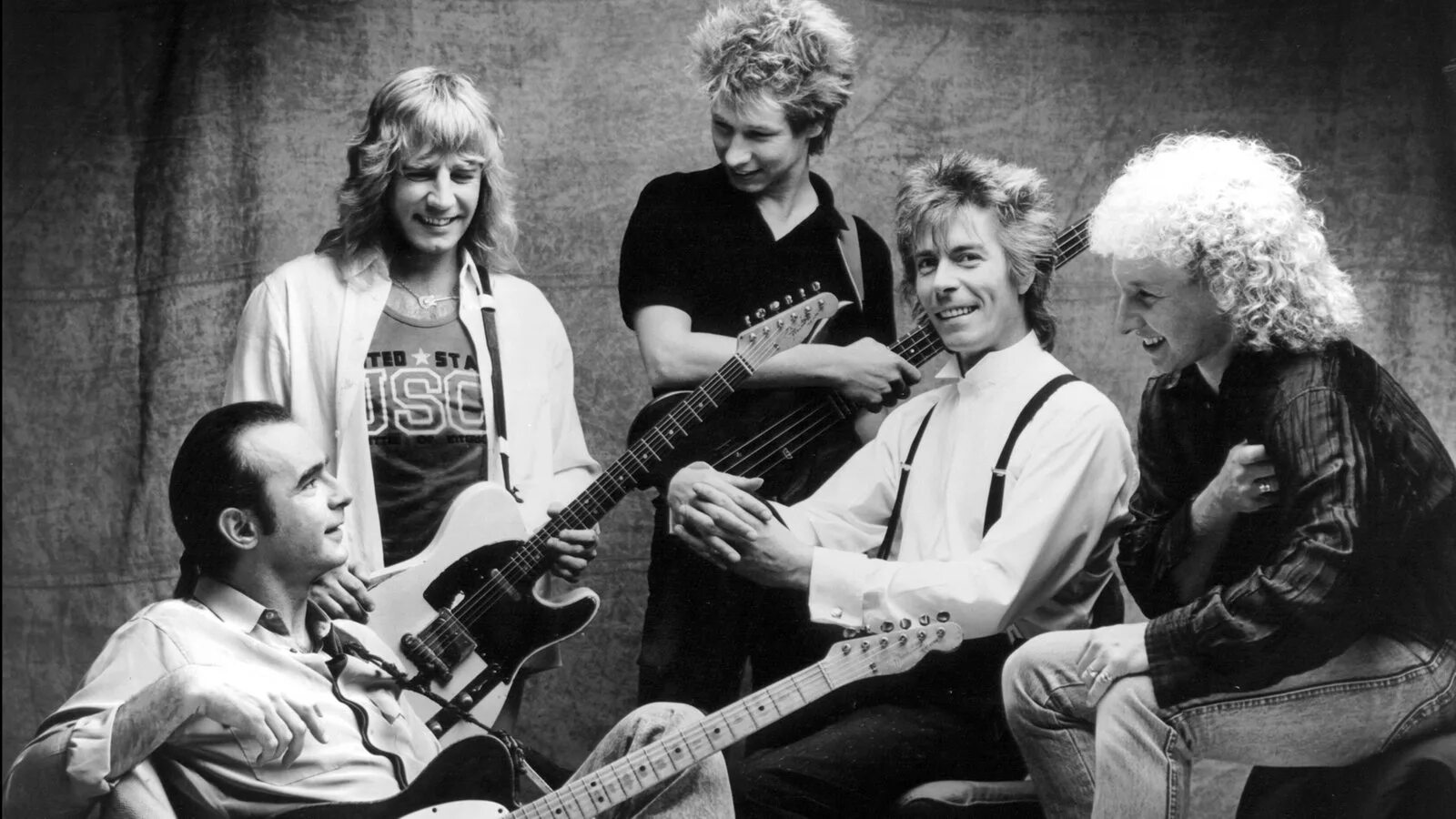 Группа status quo. Группа status quo 1984. статус кво группа фото. группа status quo 1985.