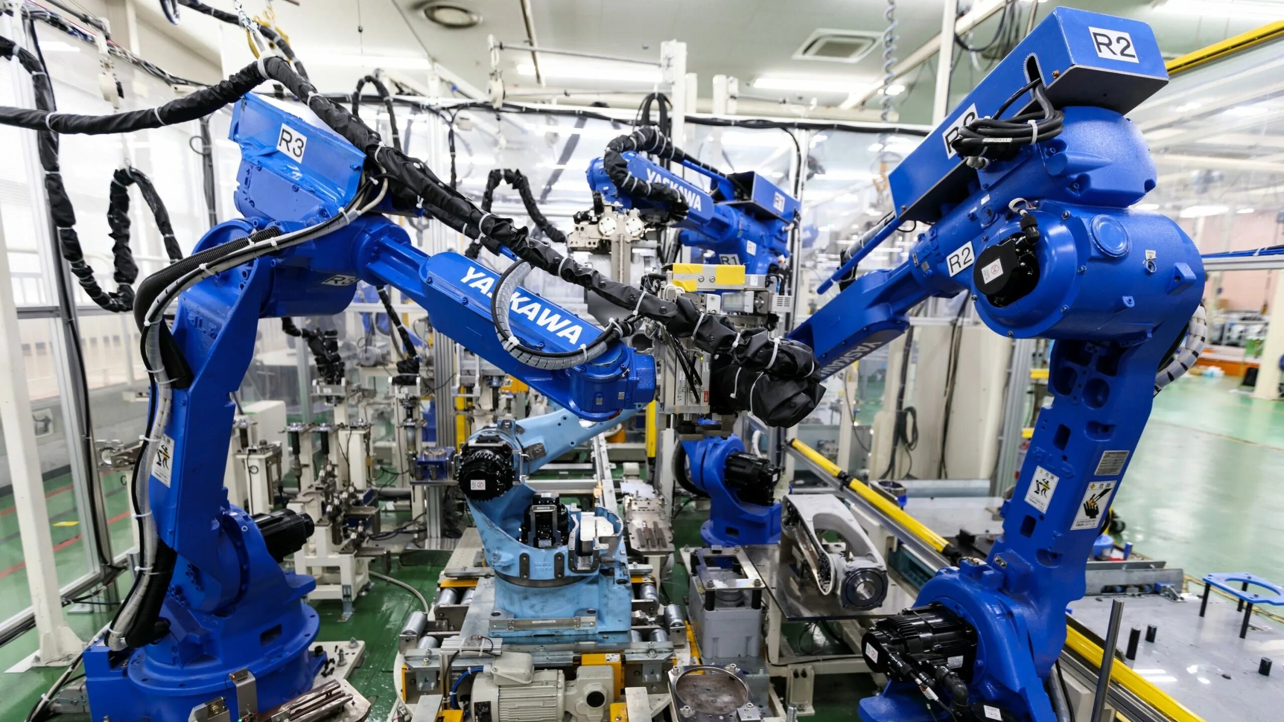 Стационарные роботы примеры. Робот яскава. Роботизированный комплекс Yaskawa. Компания Yaskawa Electric. Промышленный робот Yaskawa.