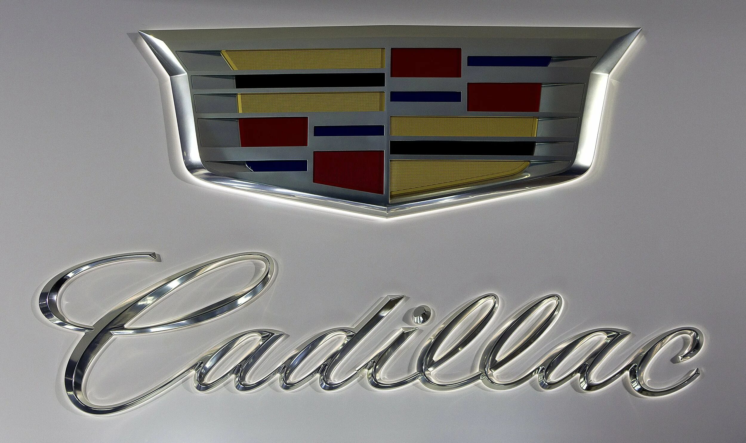 Знак Кадиллака на машине. Марки машин значки Кадиллак. Дженерал Моторс Кадиллак лого. Cadillac значок Cadillac.