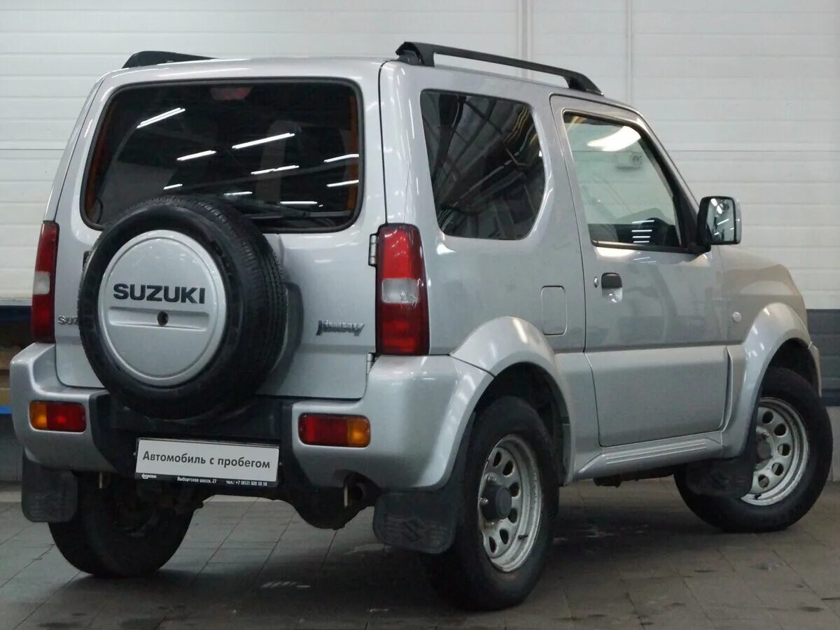 Машины сузуки с пробегом. Suzuki Jimny 2012. Suzuki Jimny 3 2012. Судзуки Джимни 2012. Suzuki Jimny 1.3 MT (85 Л.С.) 4wd.