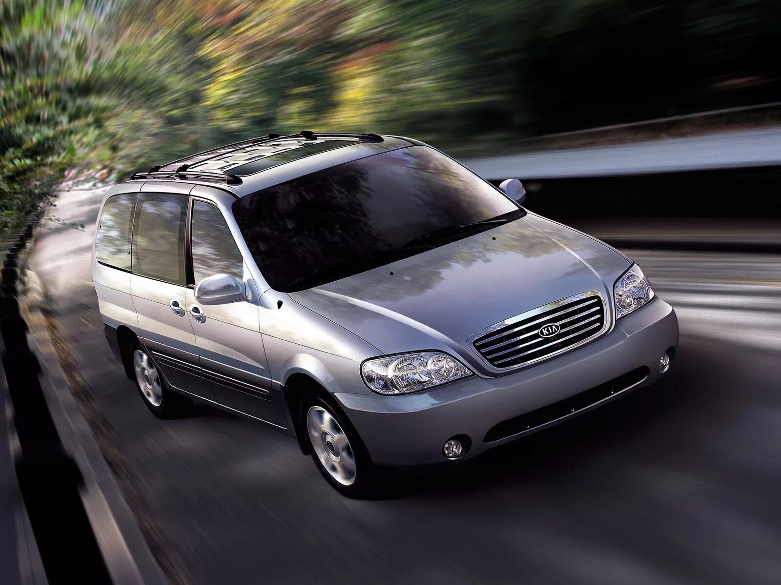 Kia carnival поколения. Kia Carnival 2002-2006. Киа Карнивал 1 поколения. Kia Carnival 2002. Киа Карнивал 5.