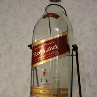Бутылка на качелях