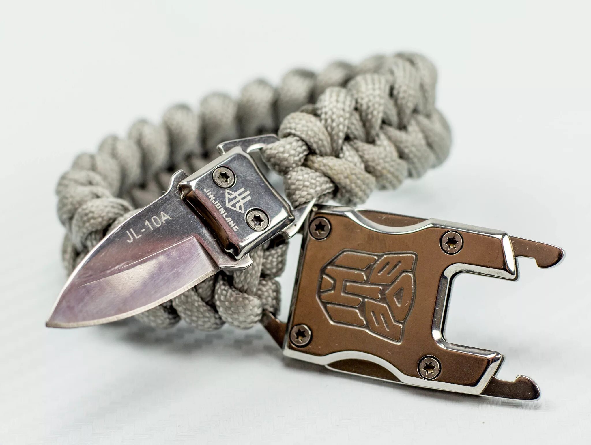 Купить темляк для ножа. Браслет из паракорда с ноджем. Zippo Surefire Paracord. Браслет из паракорда с ножом. Браслеты из паракорда мужские.