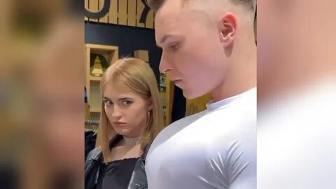 Girl Staring at Guy's Chest.