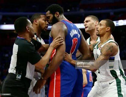 Sterling Brown of the Milwaukee Bucks and Andre Drummond of the... 