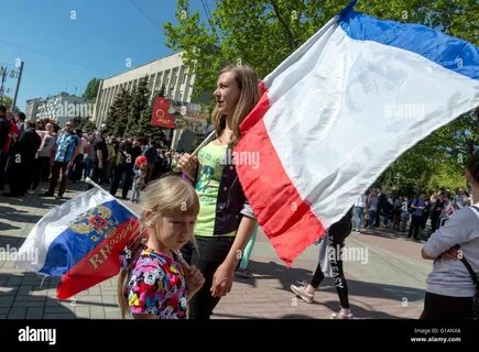 Видео в одессе женщина с российским флагом