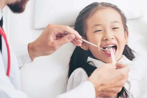 A paediatrician treats children